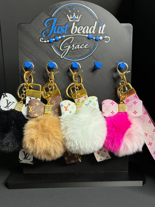 THE ELITE COLLECTION POM & WRISTLET SETS (12 DIFFERENT COLORS)